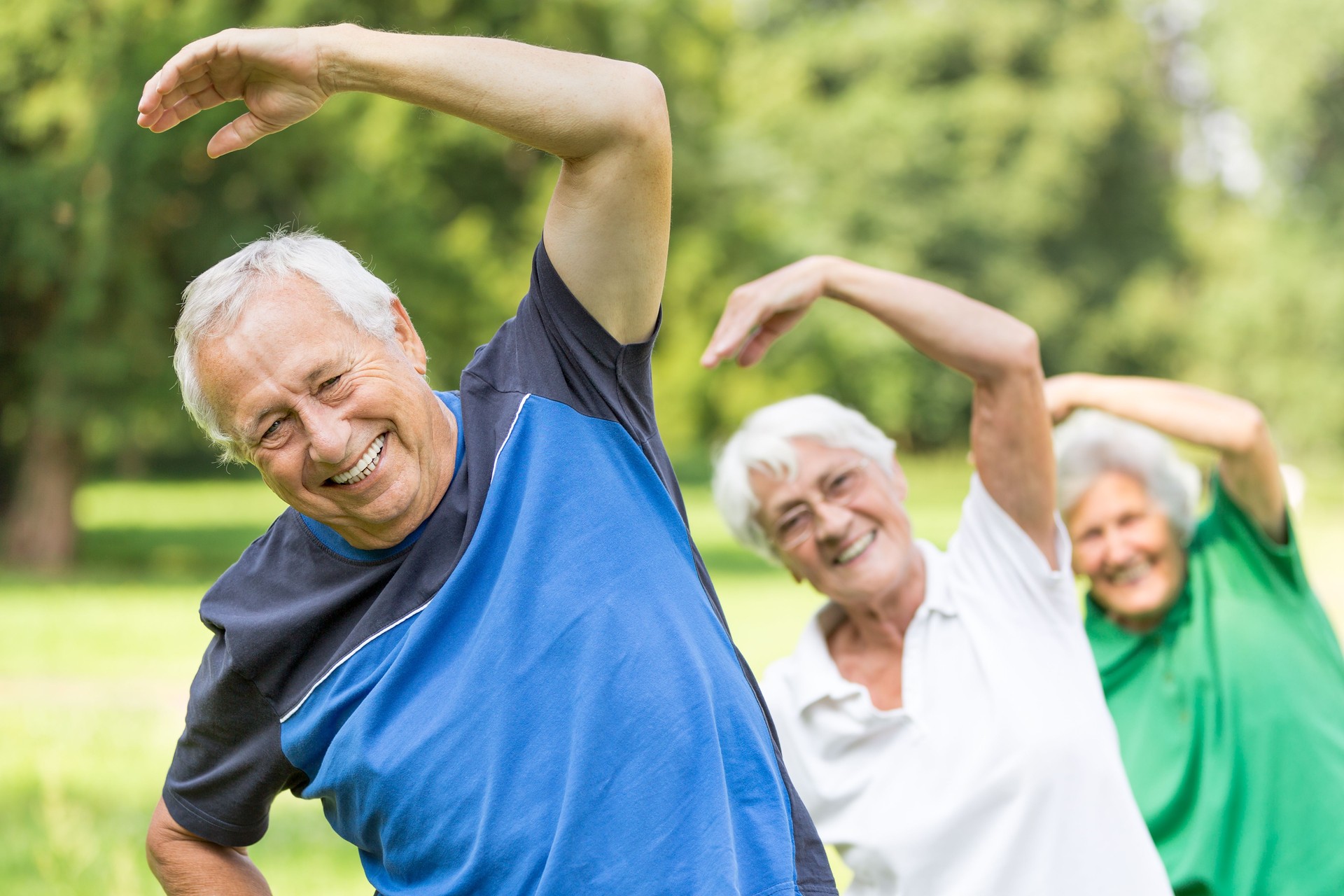 Seniors transported to their daily exercise in the park routine